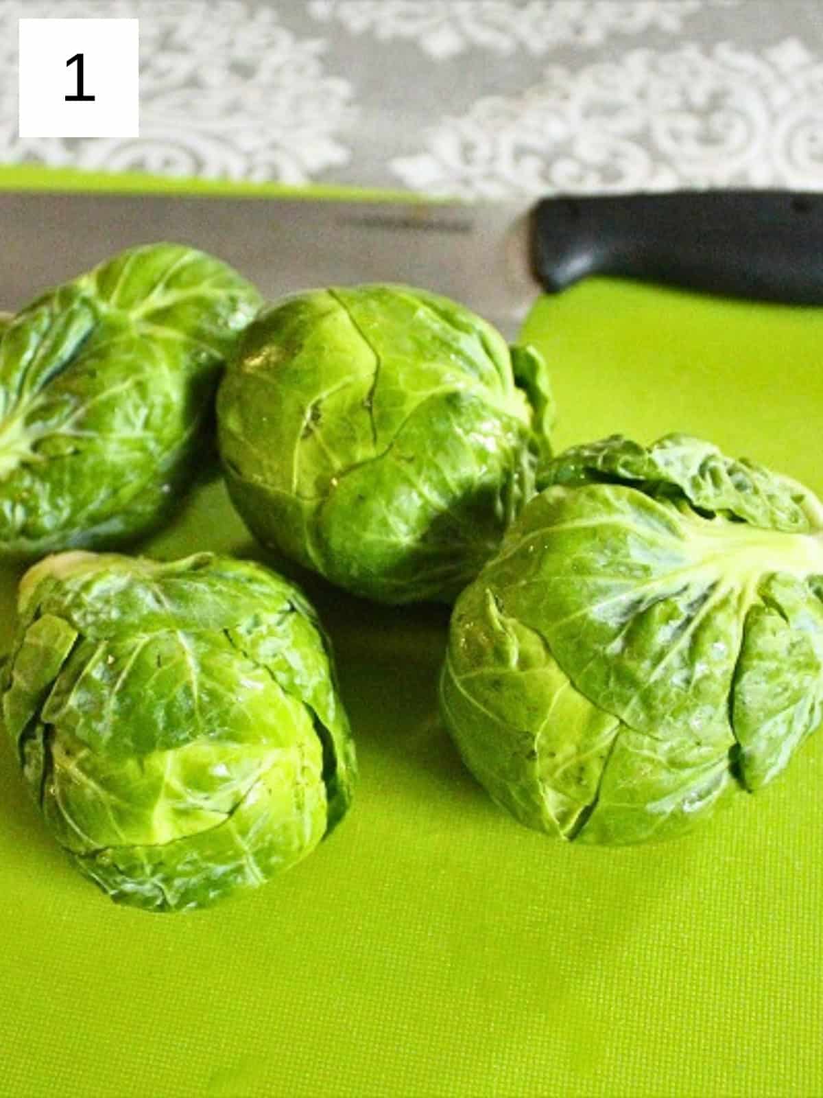 Fresh Brussels sprouts ready to be baked with garlic, part of an easy Brussels sprouts recipe.