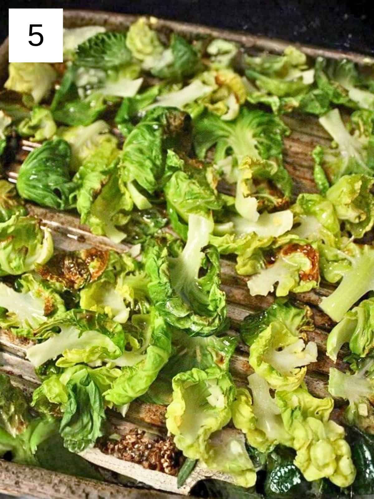 easy baked Brussels sprouts with garlic, showcasing crispy, golden-brown sprouts seasoned with garlic.