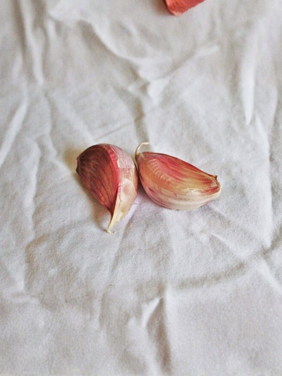 Garlic used to make baked Brussels sprouts, showcasing an easy and flavorful Brussels sprouts recipe.