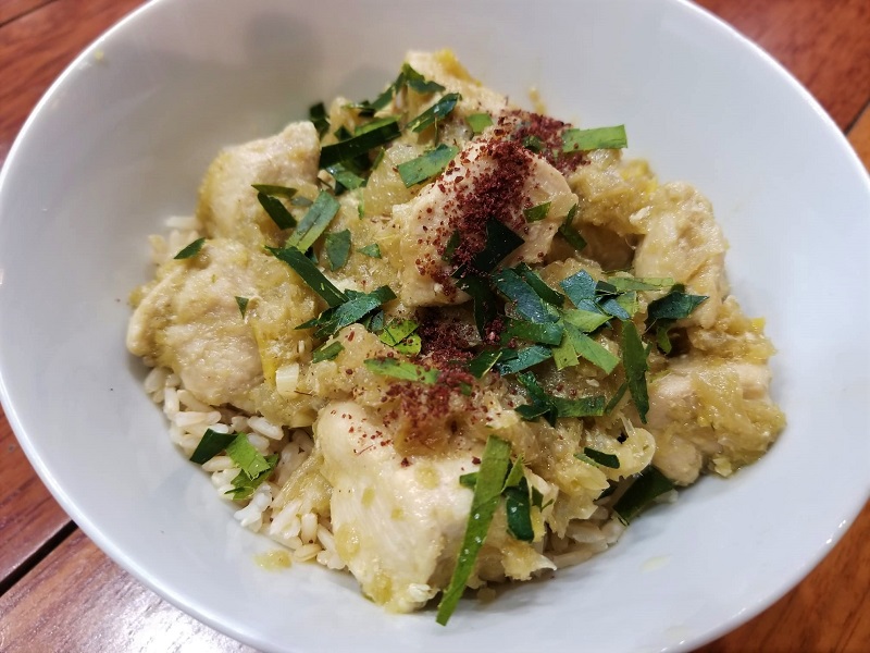 freshly-made lemongrass chicken over white rice.