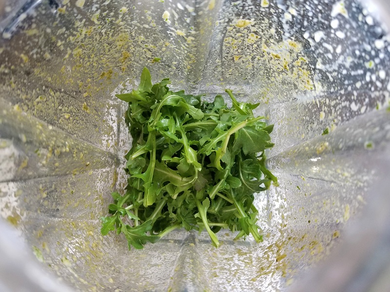 Step 1 of preparing a low histamine green smoothie with fresh ingredients, showing the initial process for a healthy green smoothie recipe.