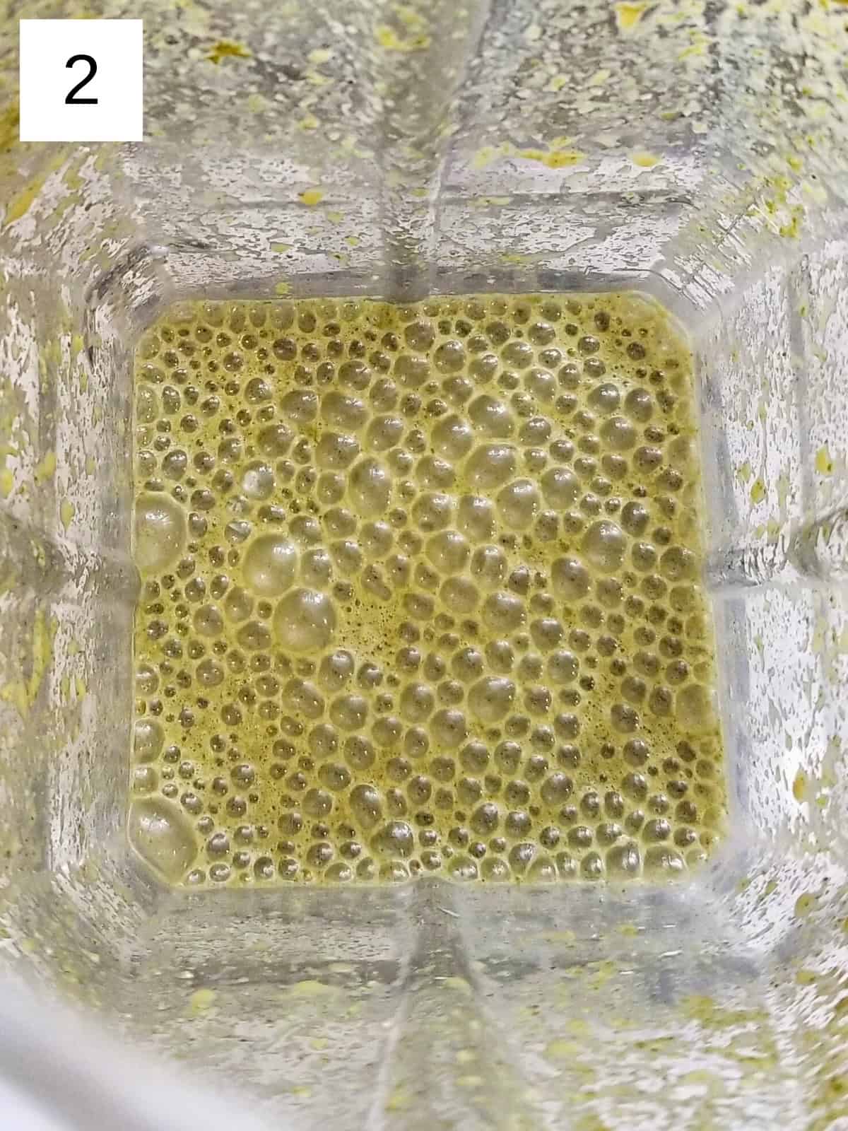 Step 2 for making a low histamine green smoothie, showing blending instructions for a creamy texture in a green smoothie recipe.