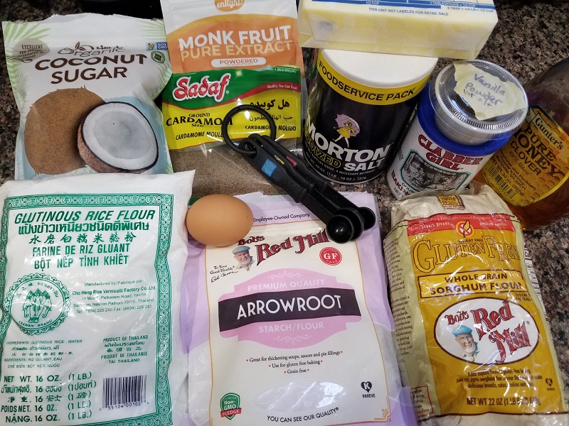 Ingredients used to make Honey Cardamom Cookies, including cardamom and honey, for a gluten-free cookie recipe.