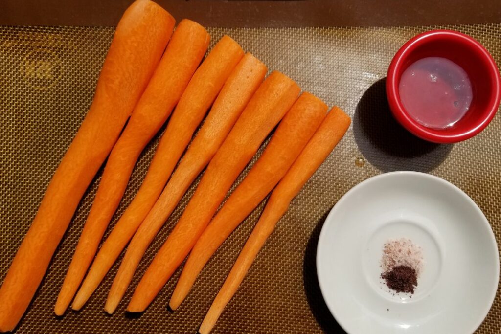 ingredients for blistered carrots, including lard, salt, sumac, and carrots.