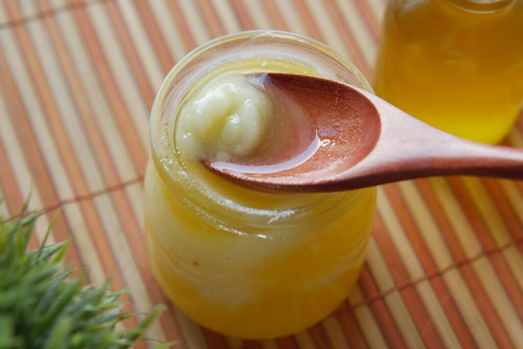 homemade ghee in a glass container.