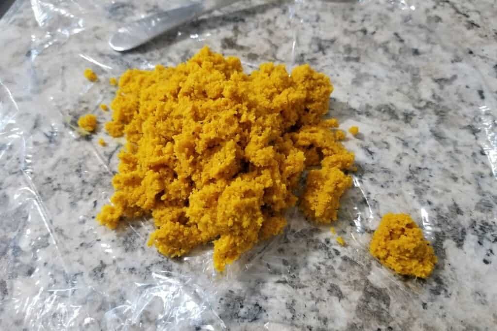 leftover turmeric and ginger fibers from the juiced mixture.