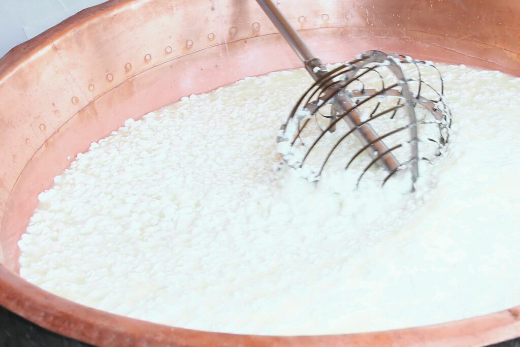 Curdling separated coconut milk.