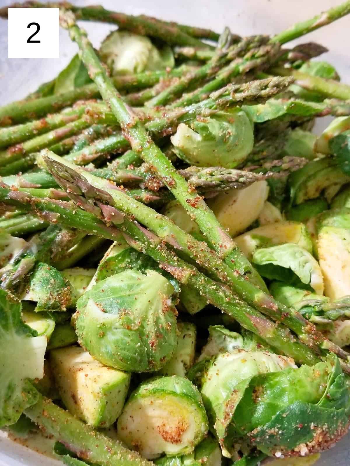 Step-by-step guide to making roasted asparagus and Brussels sprouts, showcasing a healthy recipe without vinegar.