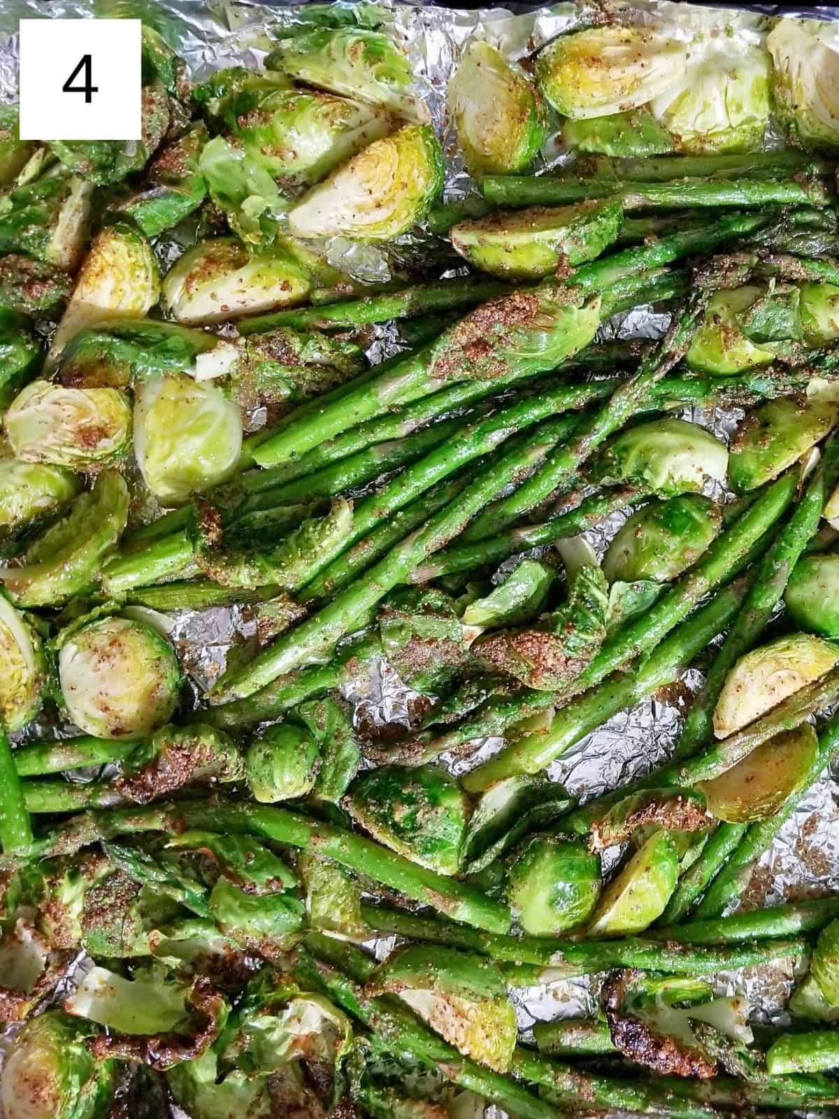 A serving of Roasted Asparagus & Brussels Sprouts, showcasing perfectly roasted veggies with a golden-brown finish. Ideal for a quick and flavorful side dish.