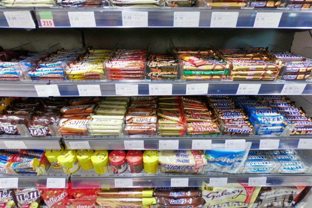 Different kinds of chocolate being displayed in a mart. 