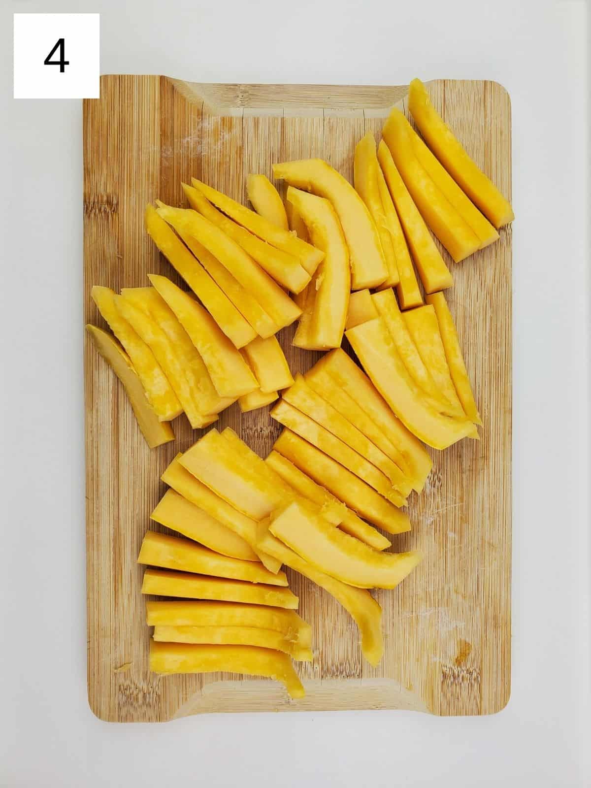 thin-cut pieces of squash for for delicata squash fries.