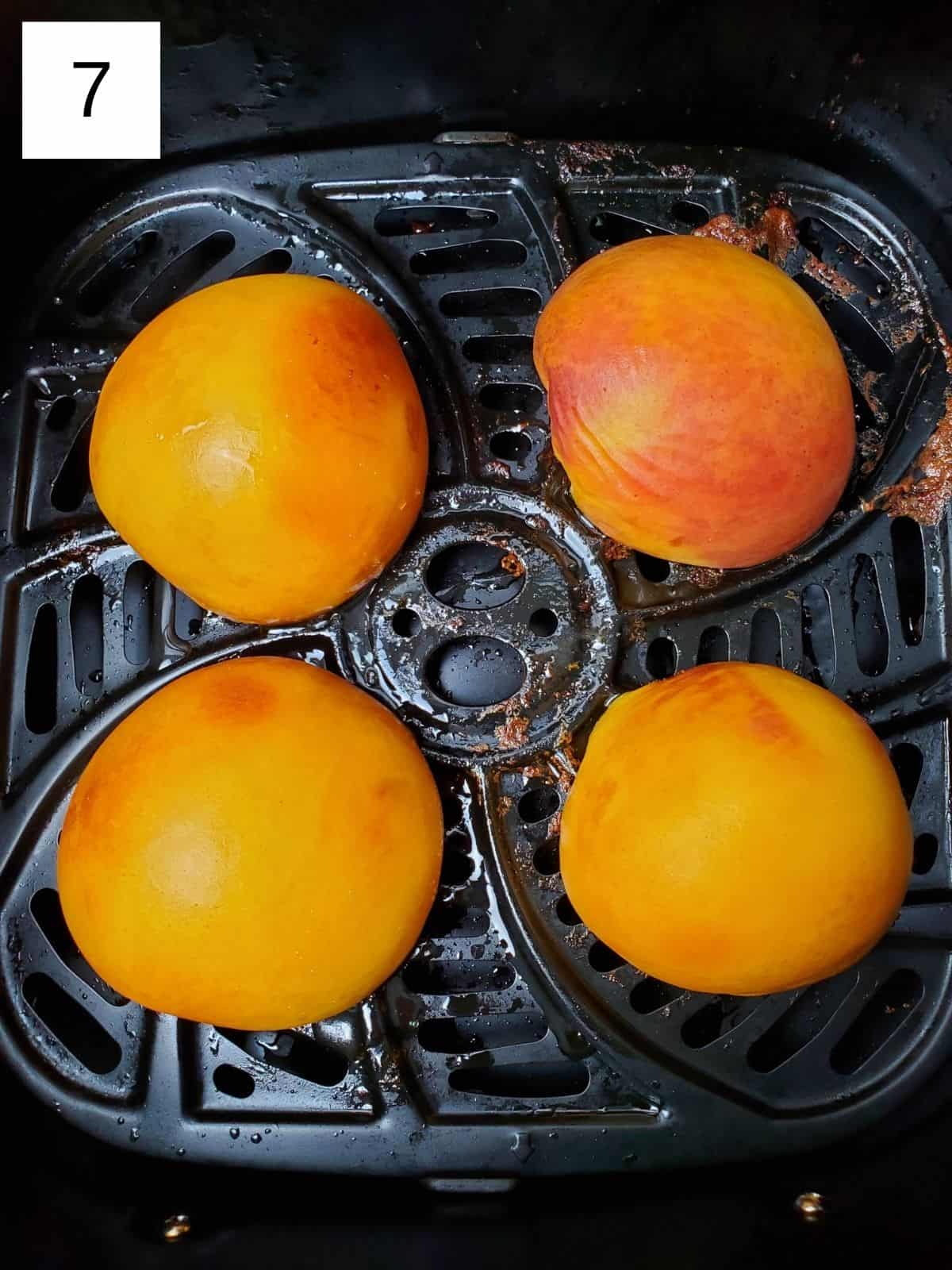 pre-cooked four halves of peaches in an air fryer