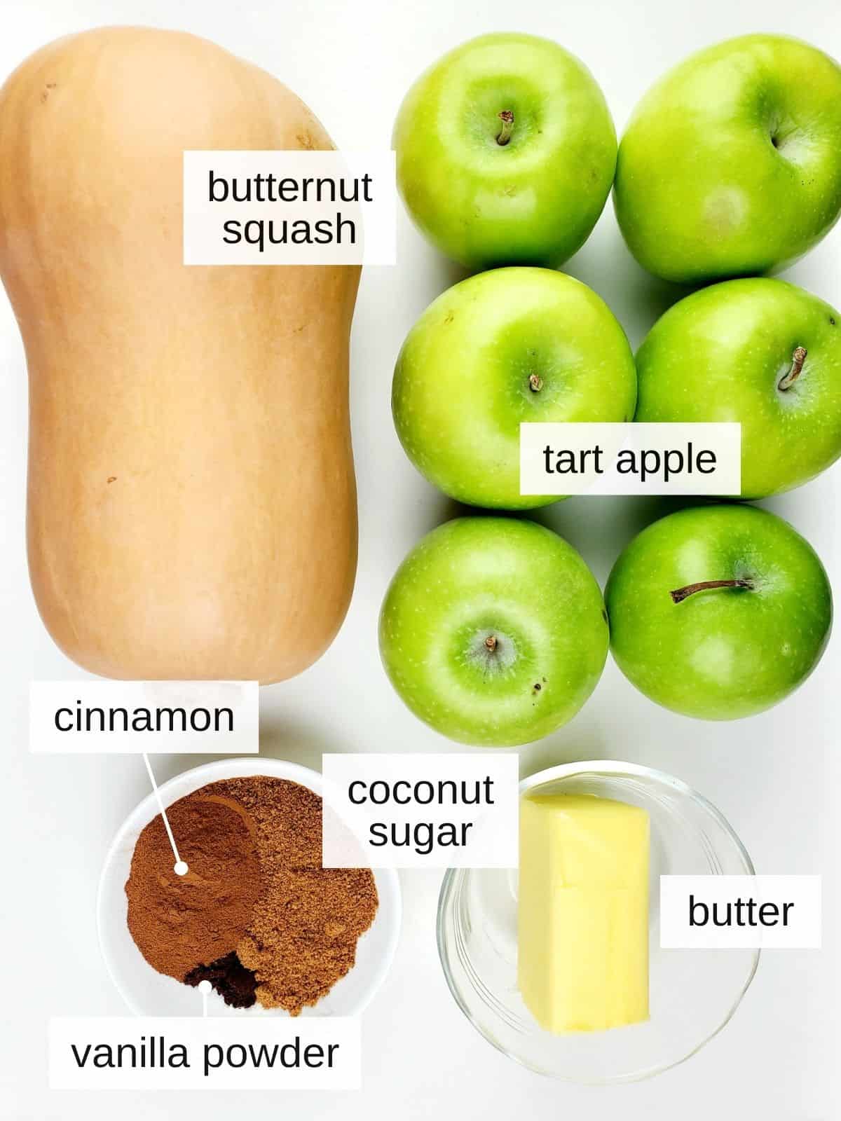 ingredients for butternut squash and apples, including vanilla powder, butter, coconut sugar, cinnamon, tart apples, and butternut squashes.
