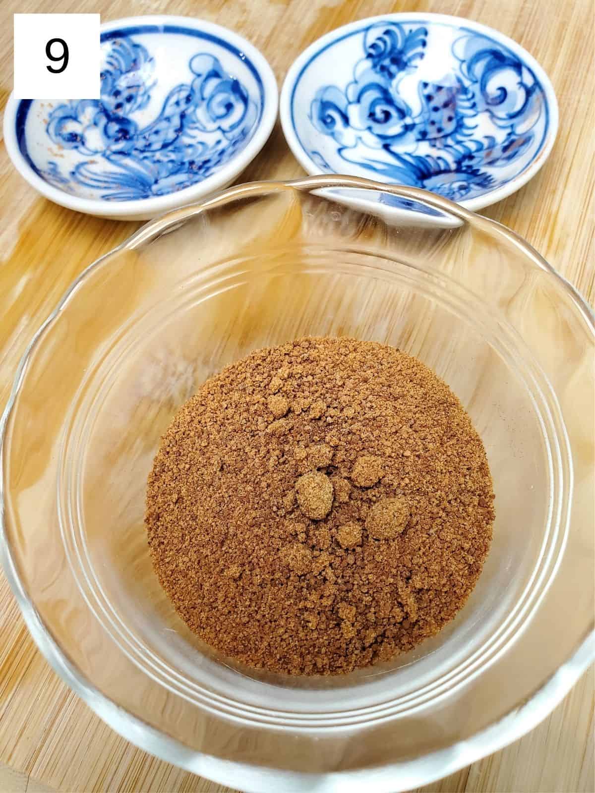a glass bowl of sugar mixture.