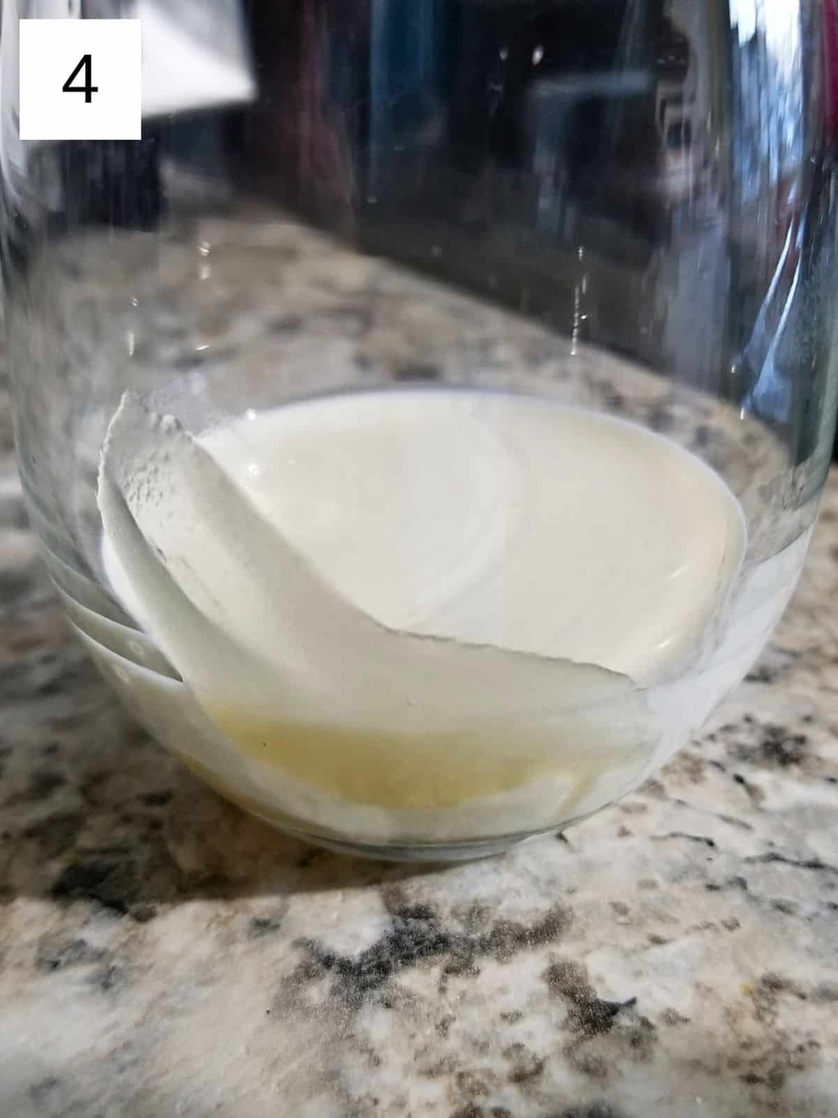 heavy whipping cream in a glass.