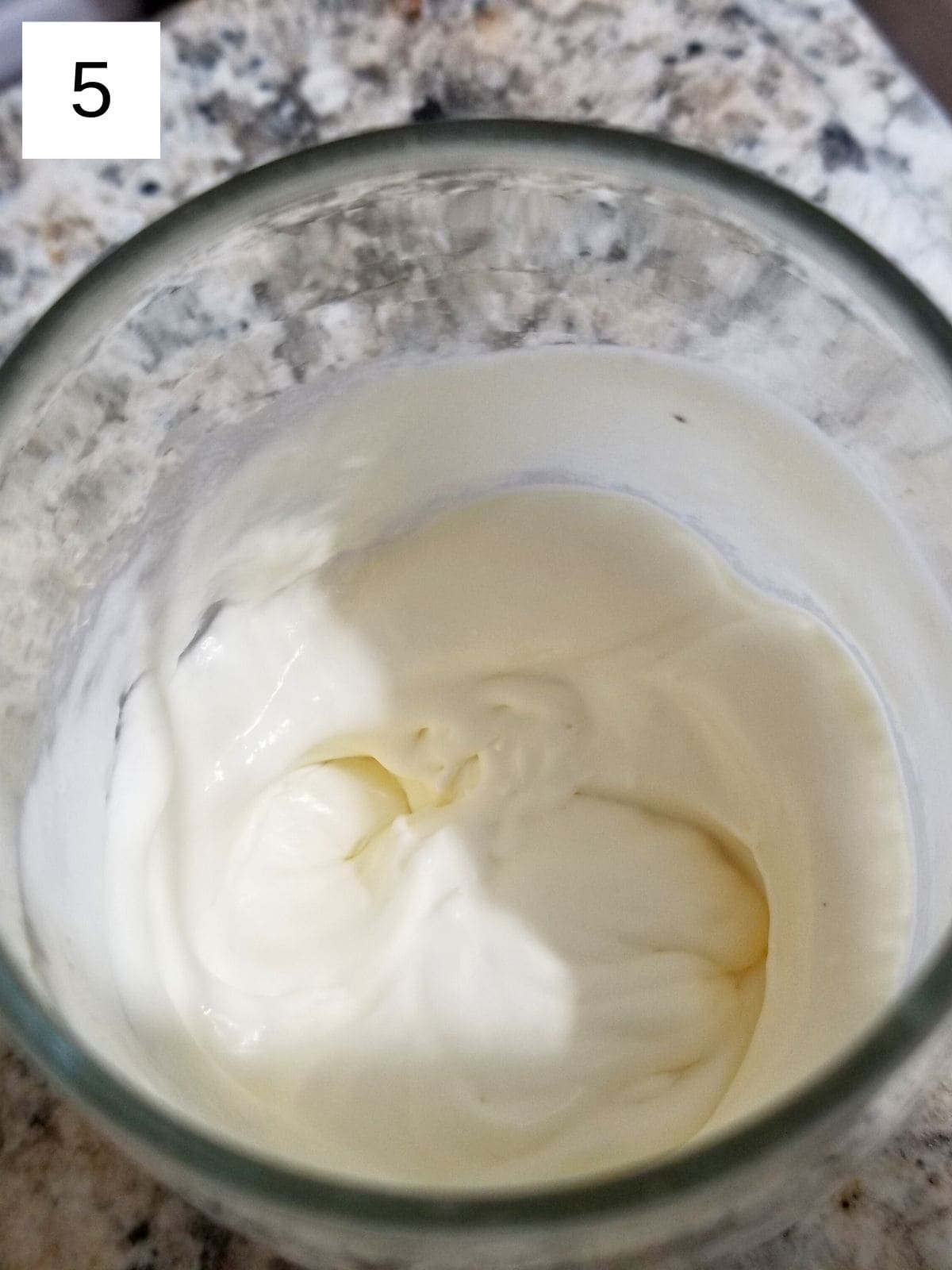 heavy whipping cream in a glass.