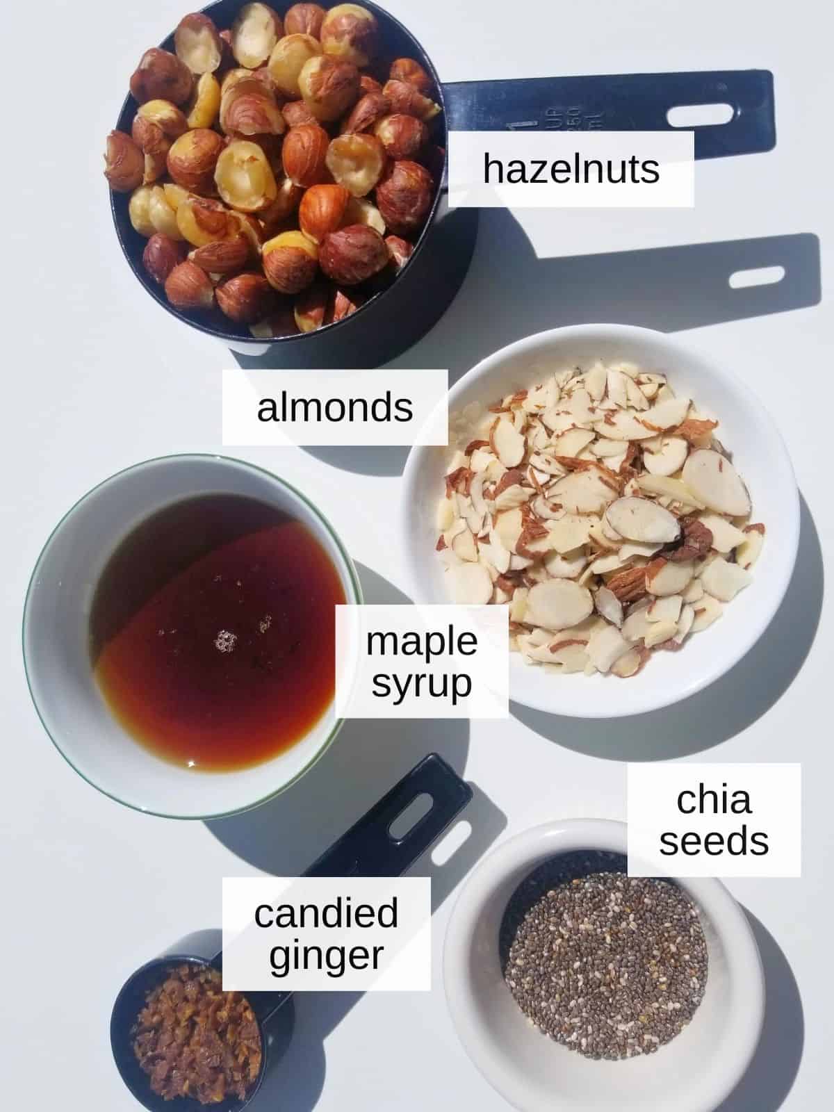 hazelnut crunch clusters with ginger ingredients, including hazelnuts, almonds, maple syrup, chia seeds, and candied ginger.