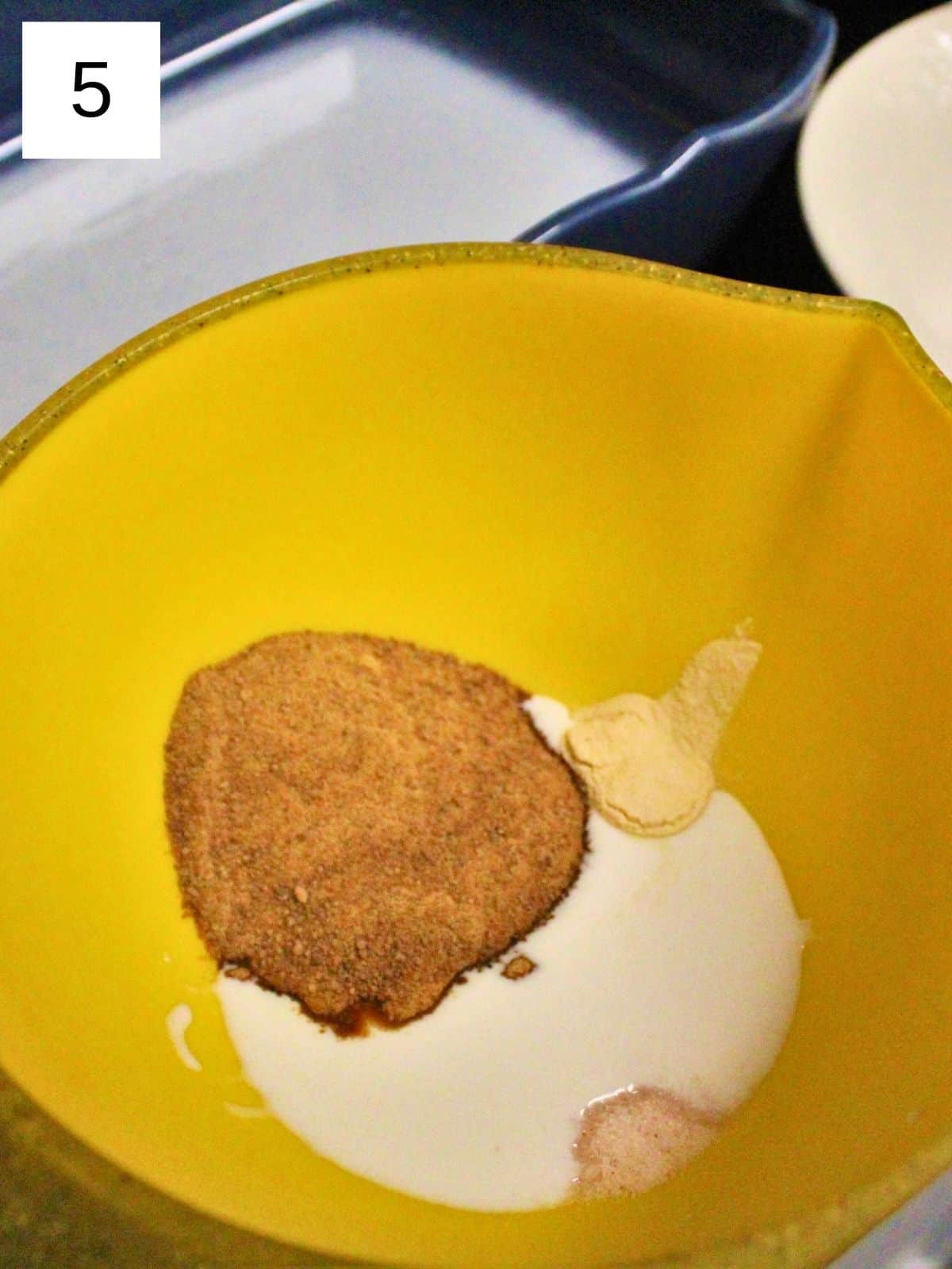 coconut cream, milk, sugar, monk fruit, and salt in bowl.