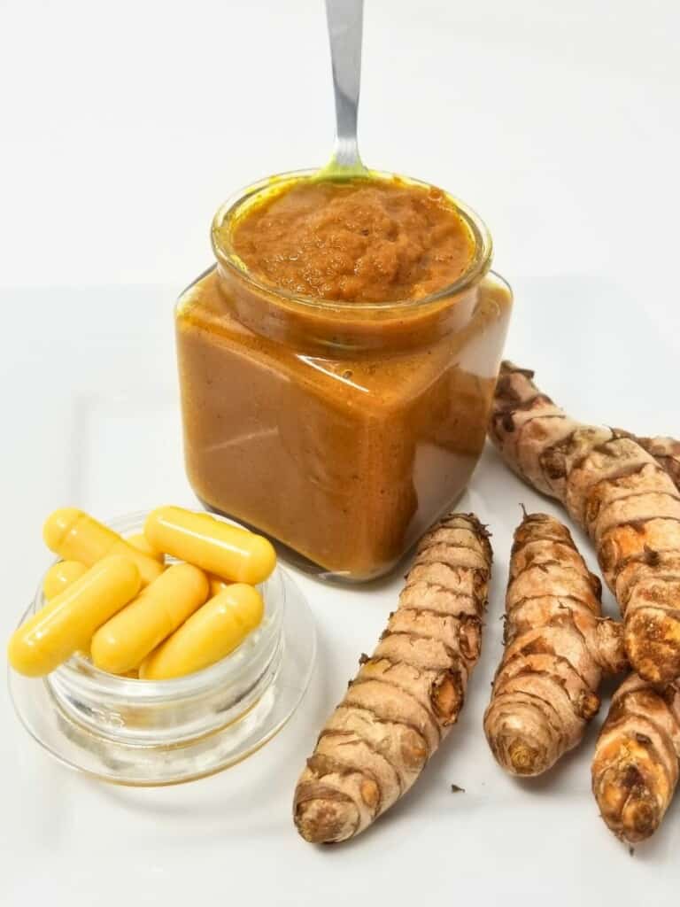 turmeric paste in a glass container.