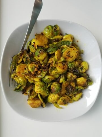 curry-spiced Indian brussels sprouts on a plate.