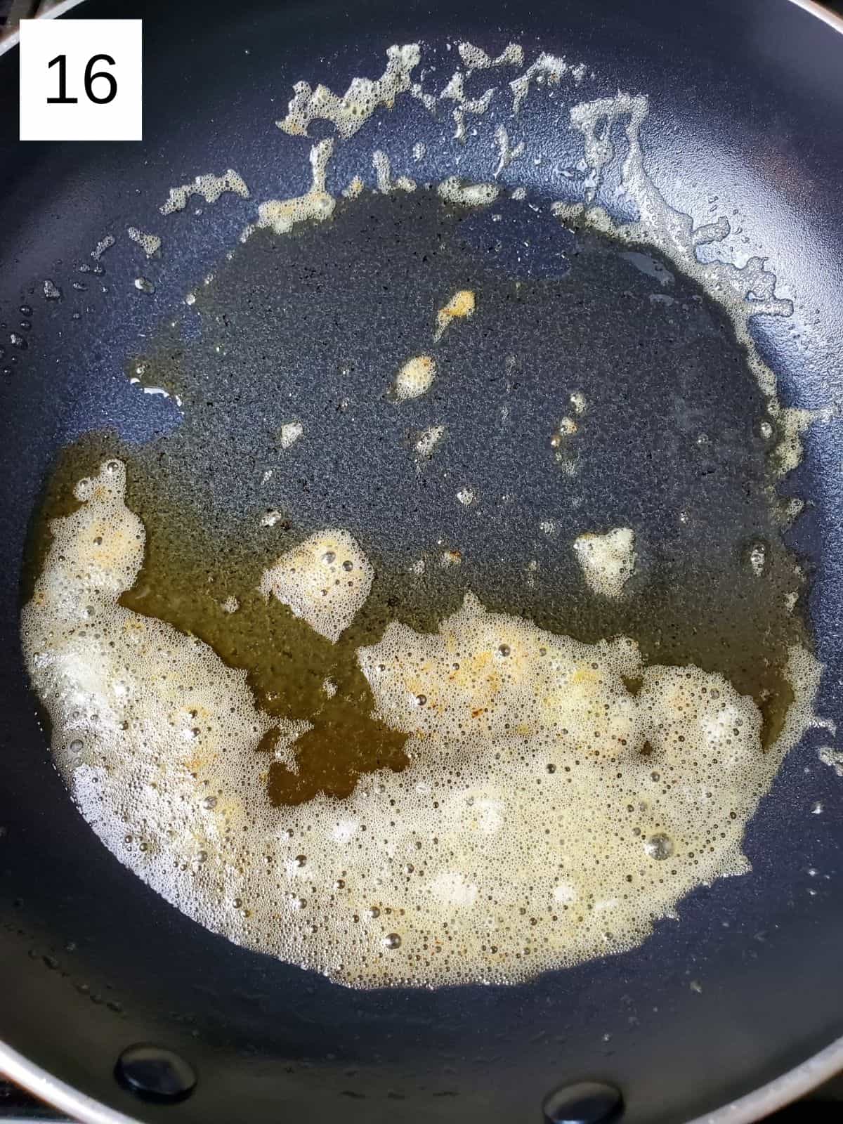 browned melted butter in a pan.