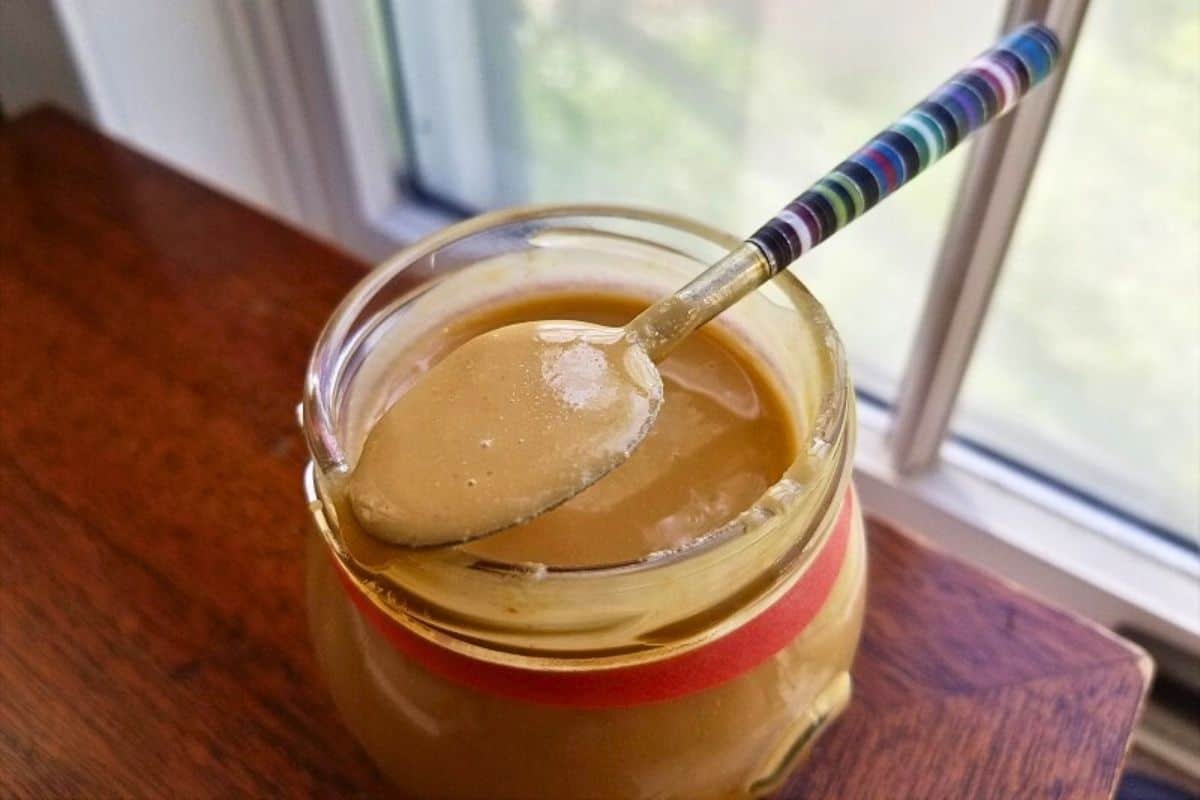 toasted macadamia nut butter in a glass jar.