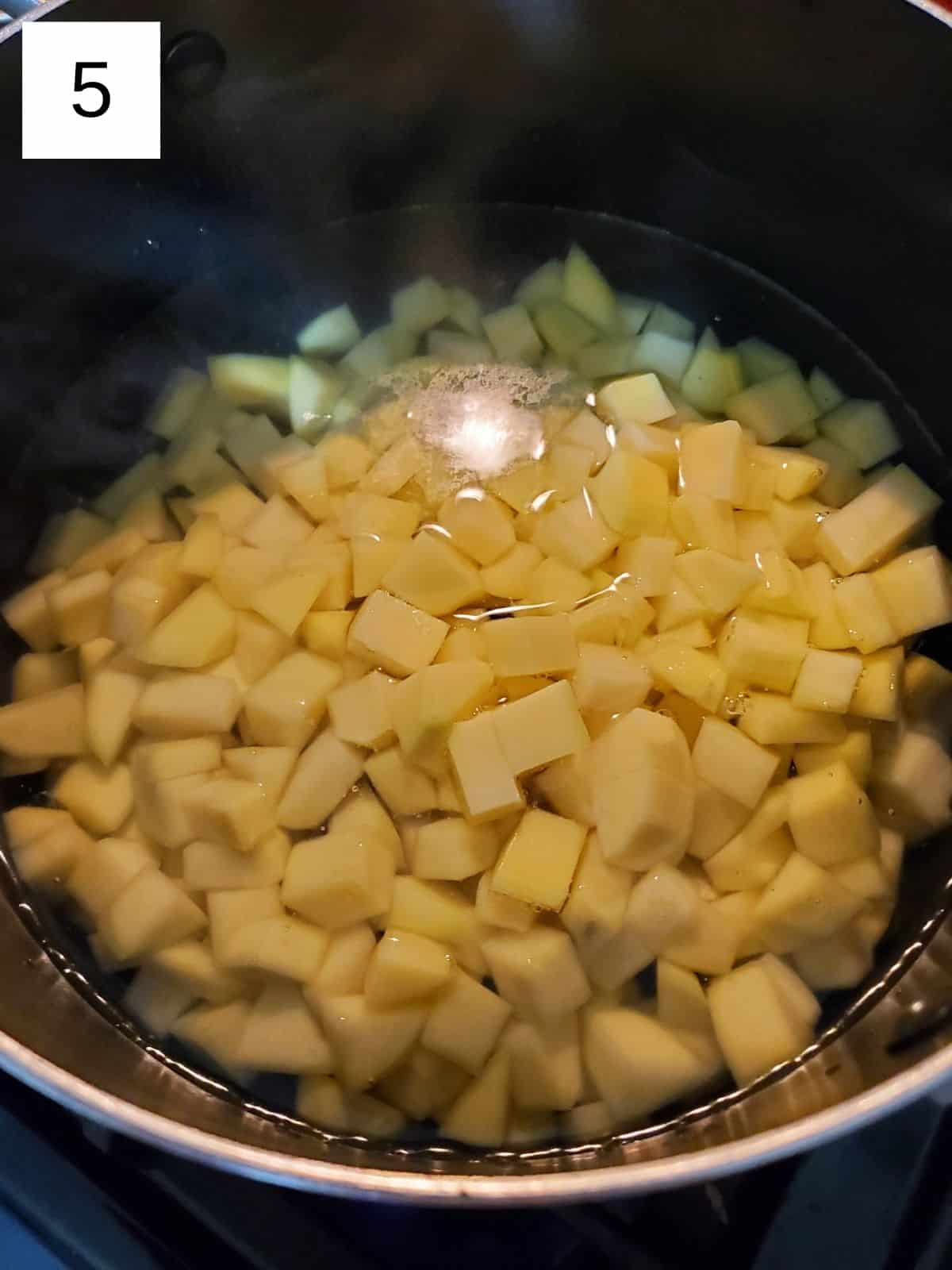small potato cubes in a pot of salted water.