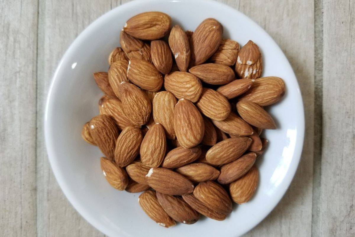 a bowl of whole almonds.