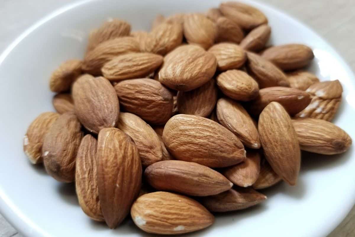 a bowl of whole almonds.