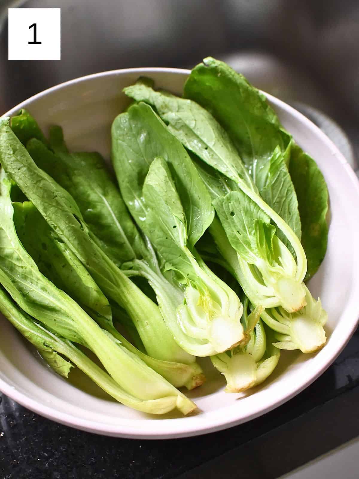 washed bok choy in a bowl.