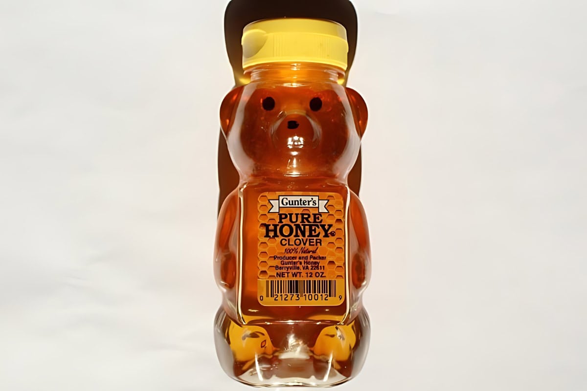 A bear-shaped bottle of Gunter's Pure Honey Clover.