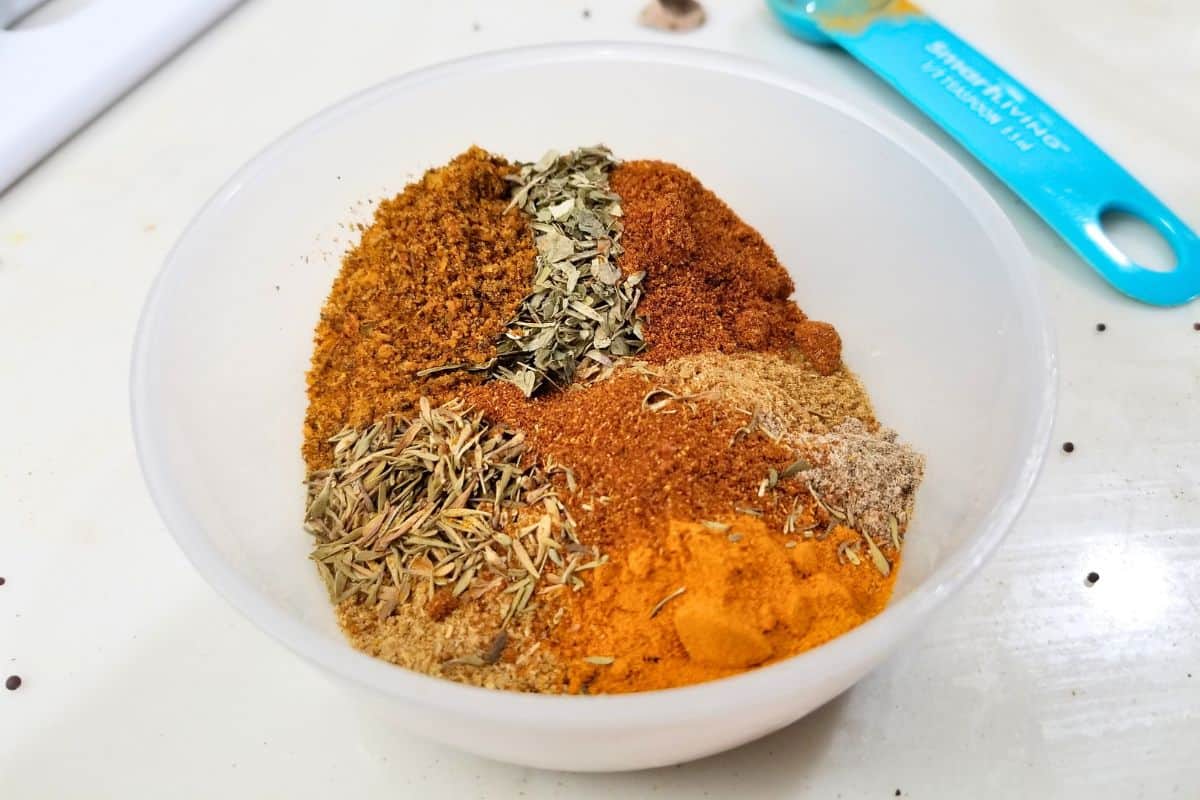 mixture of herbs and spices in a plastic bowl.