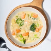 Warm and hearty vegetable stew in a bowl, filled with colorful chunks of vegetables.