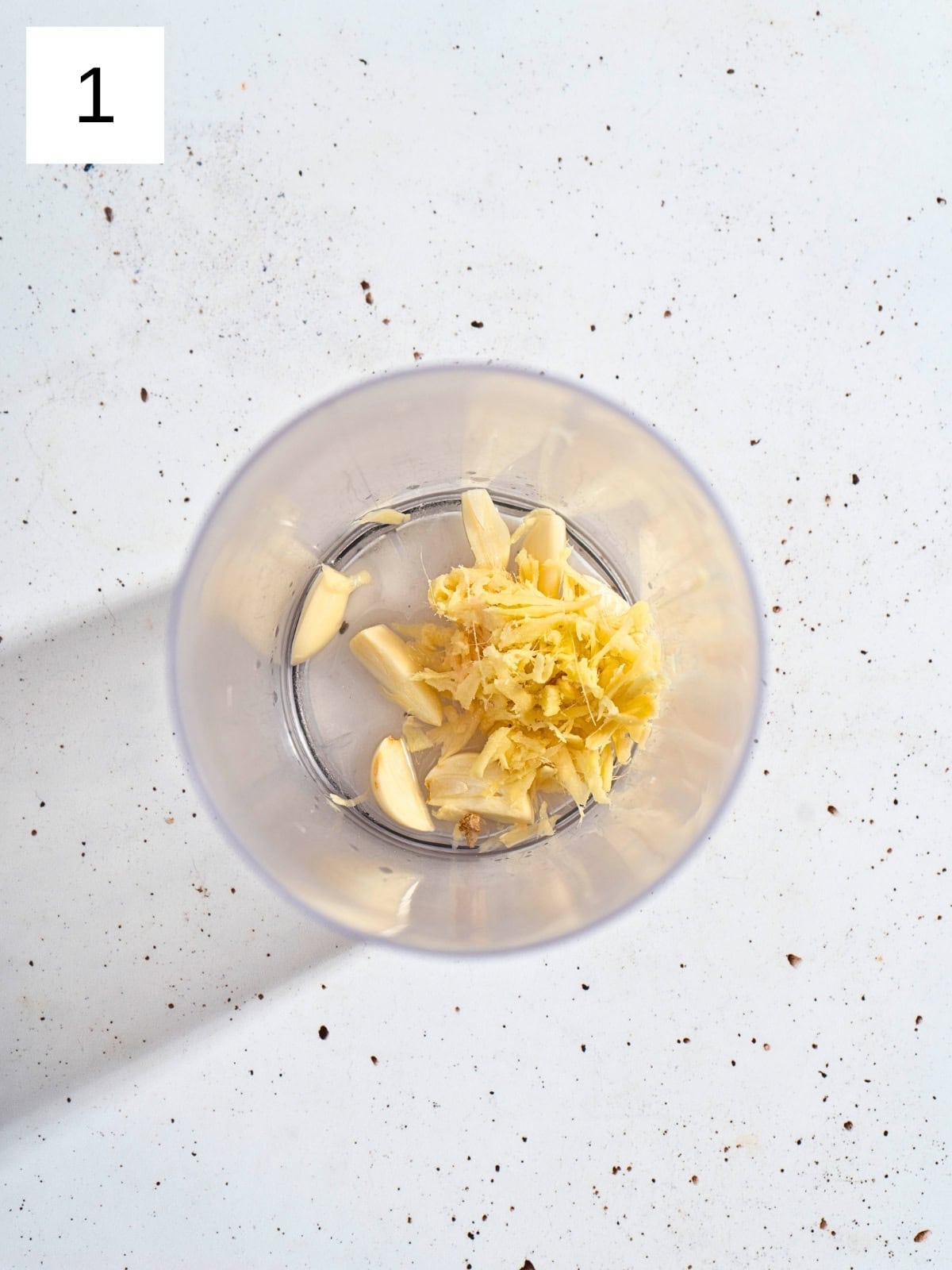 Grated ginger and garlic in a food processor.
