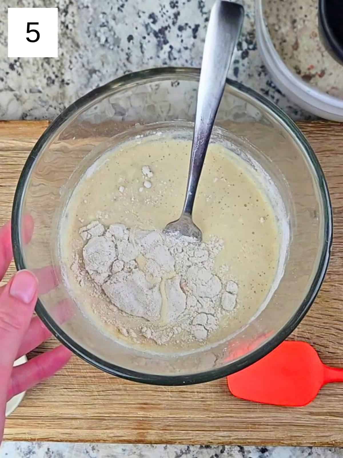 A mixture of dry and wet ingredients of gluten-free waffles.