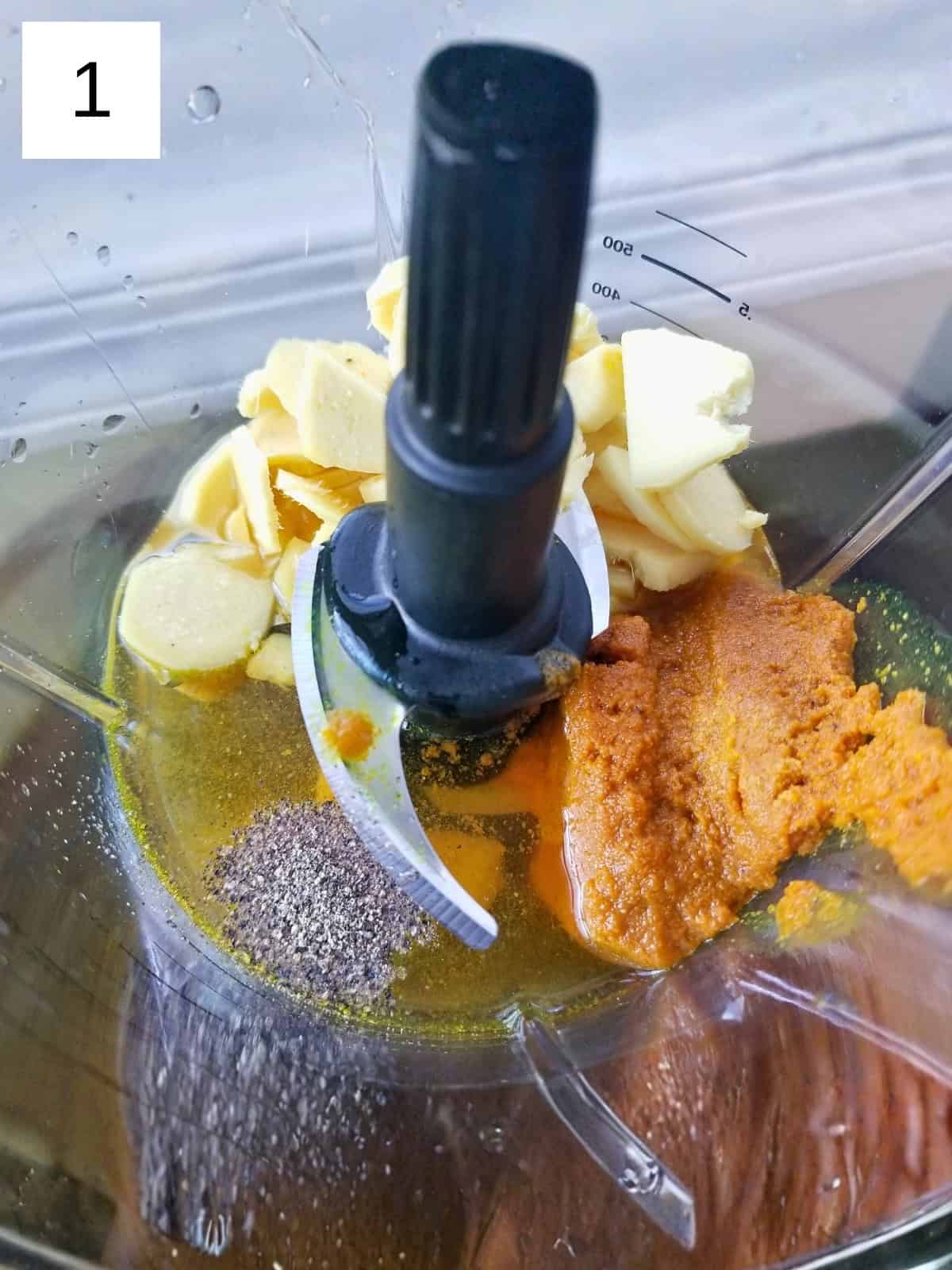 Step 1 image for making Ginger Turmeric Shots, showcasing fresh ginger and turmeric ingredients.