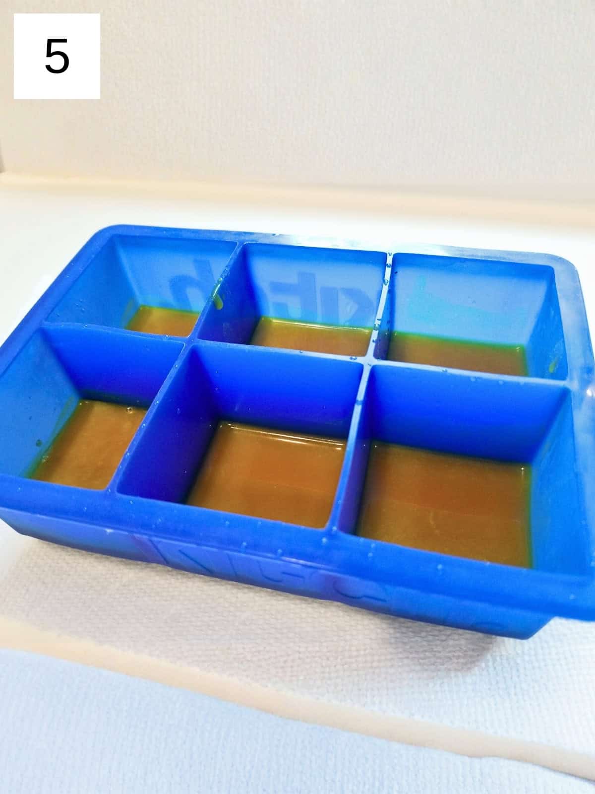 ginger turmeric shot recipe, showing the final blend of ginger and turmeric ingredients.