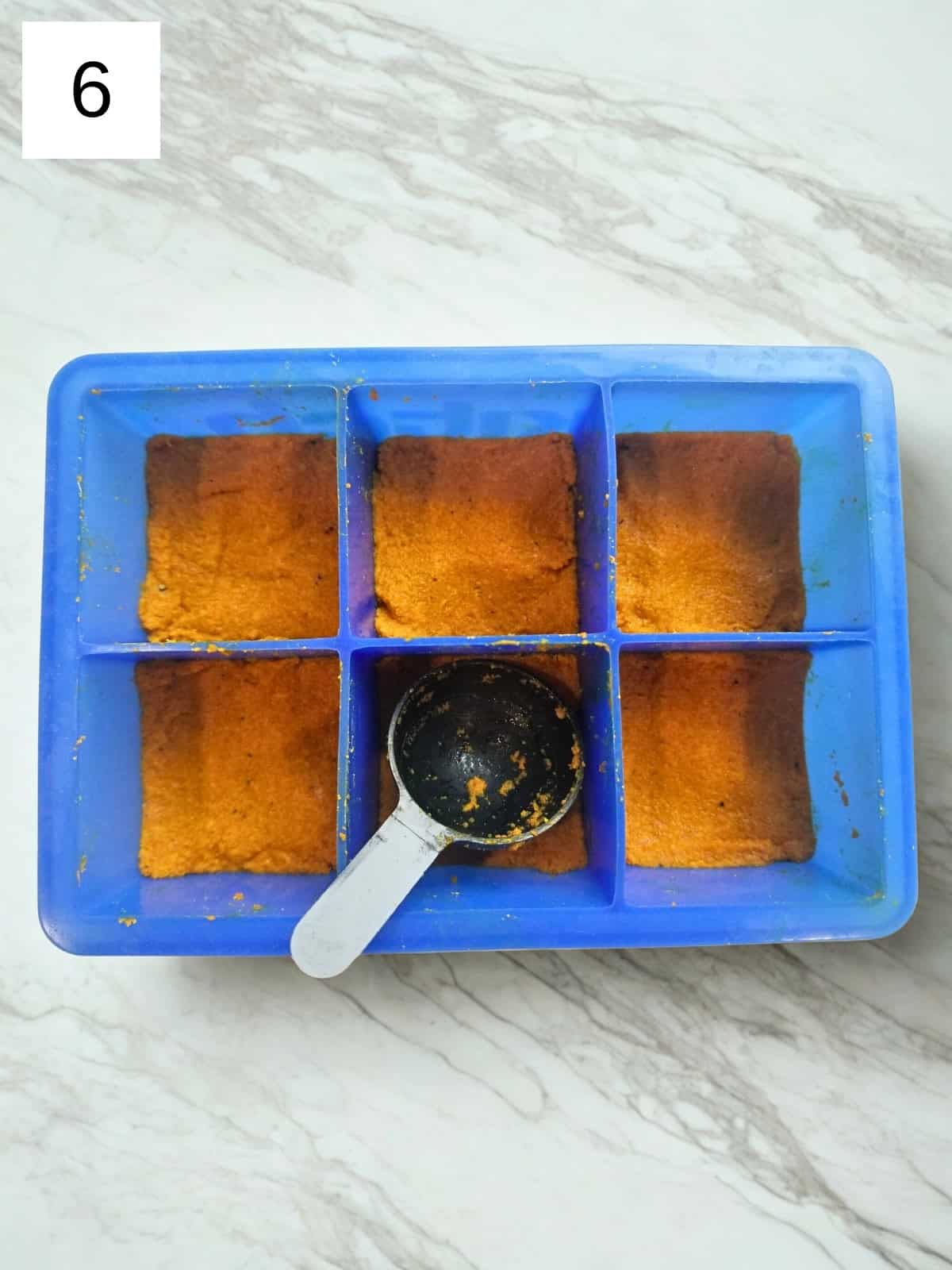 ginger turmeric shot recipe, showing the final blend of ginger and turmeric ingredients.