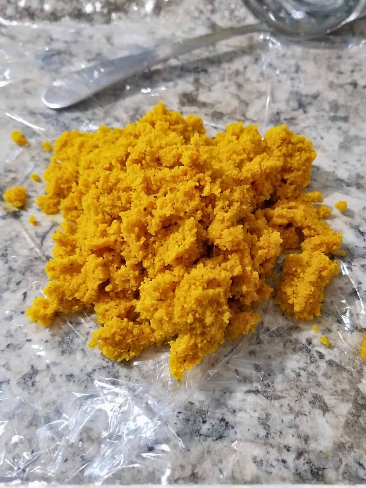 leftover turmeric and ginger fibers from the juiced mixture.