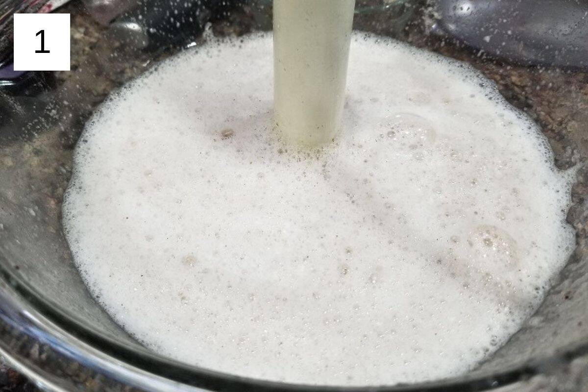 A mixture of water and flax meal in a glass bowl.