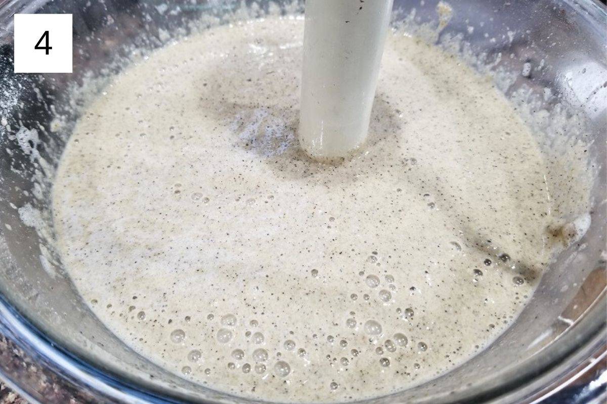 A mixture of oat milk pancake batter in a glass bowl.