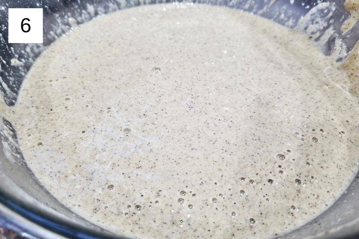 A mixture of oat milk pancake batter in a glass bowl.