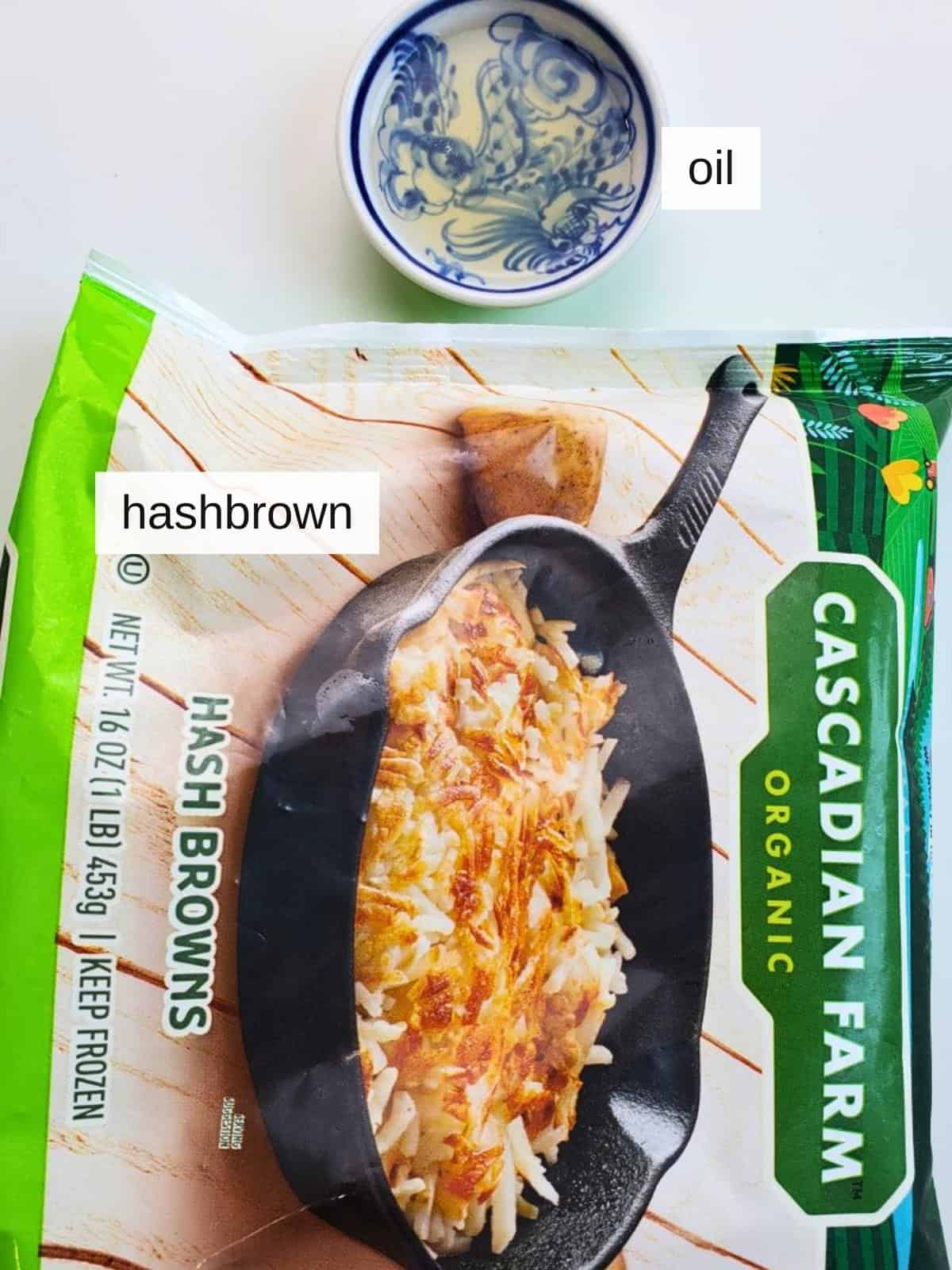 Ingredients for air fryer hashbrowns, including a pack of frozen hashbrowns and oil.