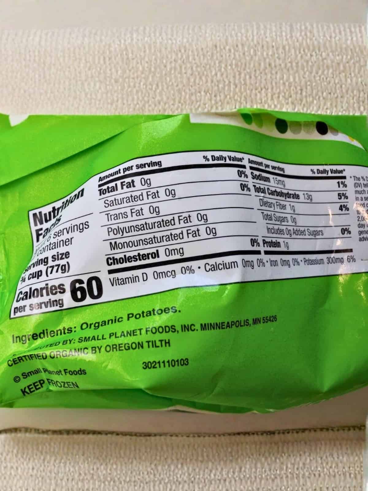Back print of a pack of frozen hashbrowns showcasing its nutrition facts.